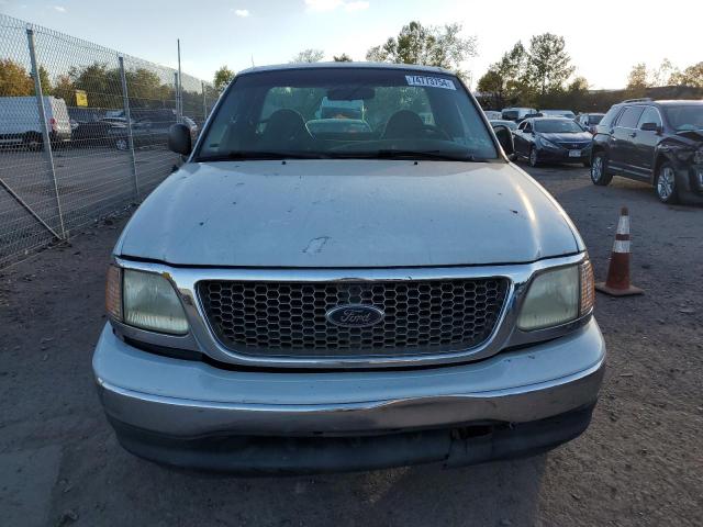 Photo 5 from auction – 1999 FORD F150 with VIN 1FTRF17W5XKA84370