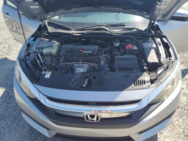 Photo 11 from auction – 2017 HONDA CIVIC LX with VIN 19XFC2F5XHE023501
