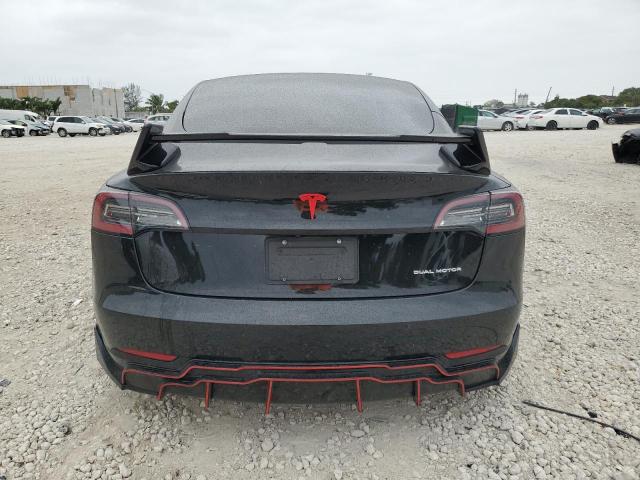 Photo 6 from auction – 2021 TESLA MODEL 3 with VIN 5YJ3E1EB1MF044157