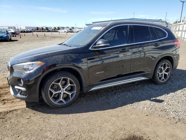 Photo 1 from auction – 2018 BMW X1 XDRIVE2 with VIN WBXHT3C32J5K30552