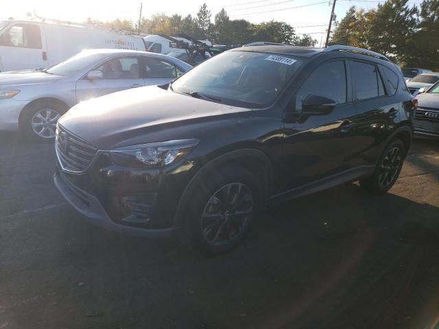 MAZDA CX-5 GT 2016 with VIN JM3KE4DY4G0618408 - Photo from auction