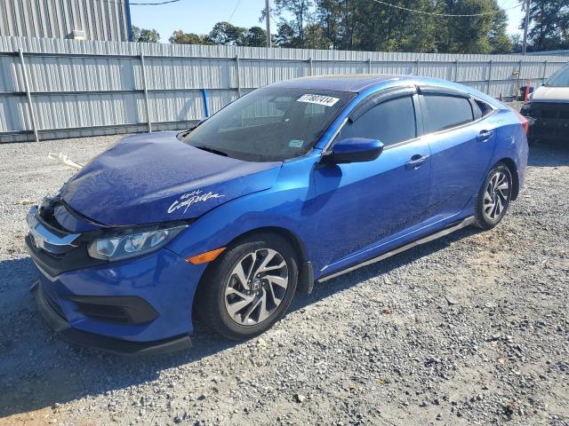HONDA CIVIC EX 2018 with VIN 2HGFC2F70JH599076 - Photo from auction