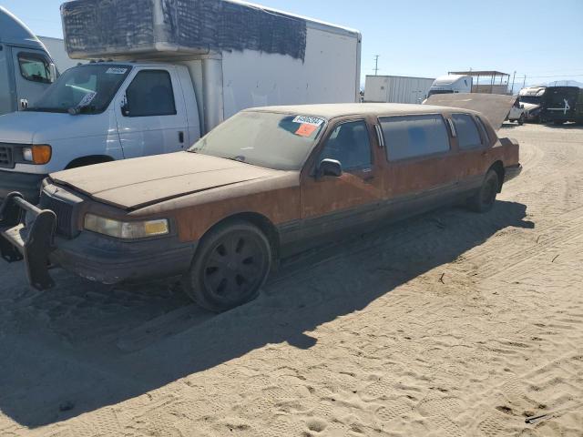 LINCOLN TOWN CAR E 1997 with VIN 1LNLM81W0VY678786 - Photo from auction