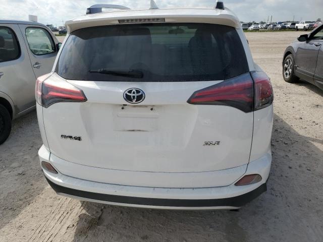 Photo 6 from auction – 2016 TOYOTA RAV4 XLE with VIN JTMWFREV7GJ060539