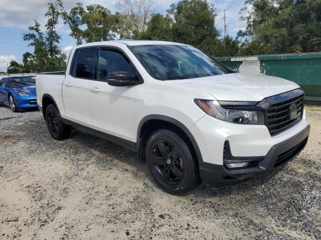 Photo 4 from auction – 2022 HONDA RIDGELINE with VIN 5FPYK3F87NB006017
