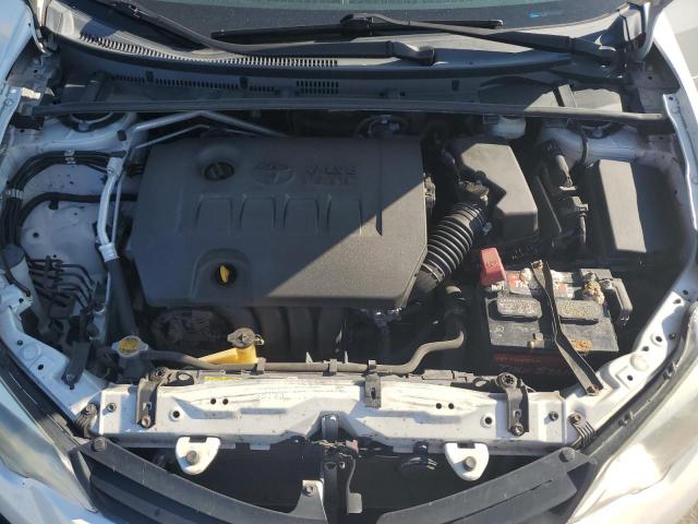 Photo 11 from auction – 2014 TOYOTA COROLLA EC with VIN 5YFBPRHE3EP010768