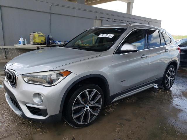 BMW X1 XDRIVE2 2017 with VIN WBXHT3C3XH5F70805 - Photo from auction
