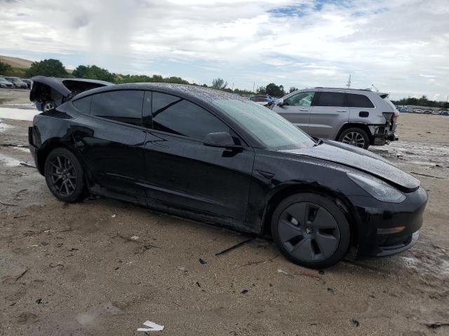 Photo 4 from auction – 2023 TESLA MODEL 3 with VIN 5YJ3E1EA2PF691081