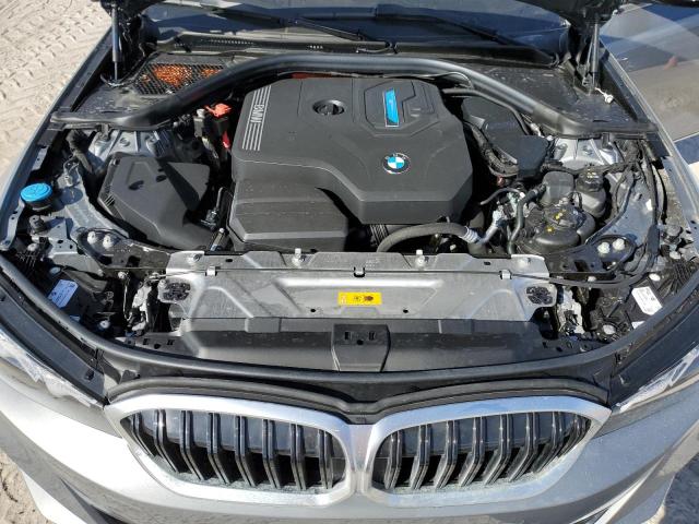 Photo 11 from auction – 2024 BMW 330E with VIN 3MW39FF07R8E10100