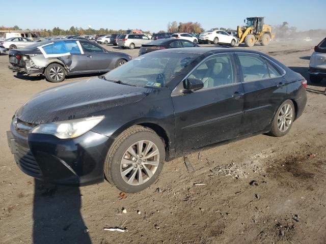 TOYOTA CAMRY LE 2016 with VIN 4T4BF1FK6GR541323 - Photo from auction