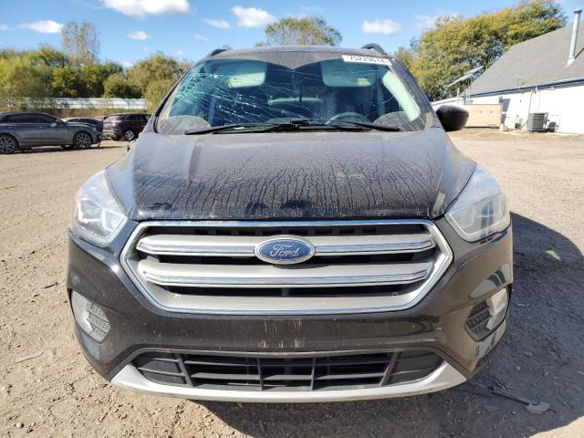 Photo 5 from auction – 2017 FORD ESCAPE SE with VIN 1FMCU9GDXHUC48352
