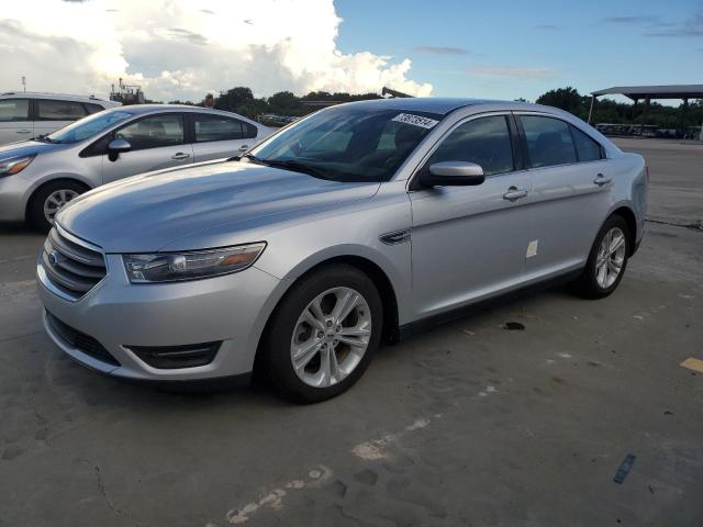 FORD TAURUS SEL 2014 with VIN 1FAHP2E87EG110377 - Photo from auction
