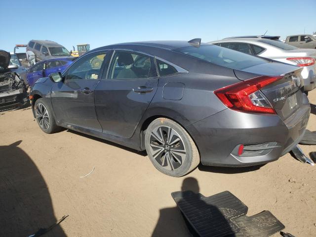 Photo 2 from auction – 2018 HONDA CIVIC EX with VIN JHMFC1F32JX005474
