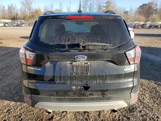 Photo 6 from auction – 2018 FORD ESCAPE SE with VIN 1FMCU0GD8JUD18724
