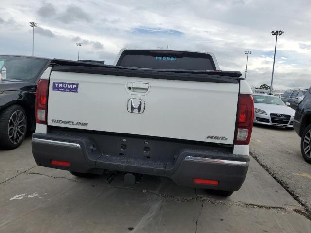 Photo 6 from auction – 2019 HONDA RIDGELINE with VIN 5FPYK3F17KB042885