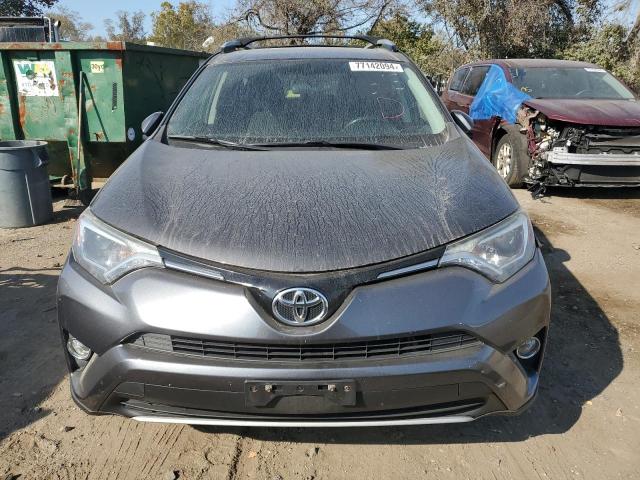 Photo 5 from auction – 2016 TOYOTA RAV4 XLE with VIN JTMRFREV4GJ077618