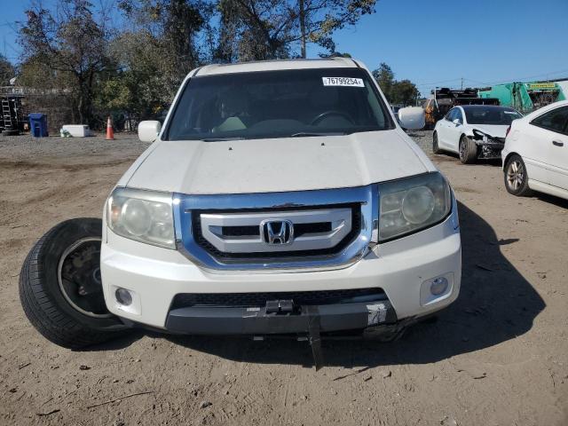 Photo 5 from auction – 2011 HONDA PILOT TOUR with VIN 5FNYF4H90BB046895