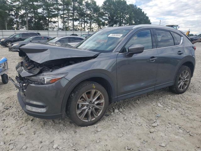 MAZDA CX-5 SIGNA 2021 with VIN JM3KFBEY3M0319102 - Photo from auction