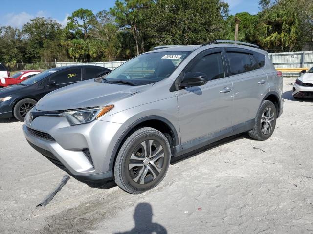 TOYOTA RAV4 LE 2018 with VIN 2T3ZFREV9JW520063 - Photo from auction