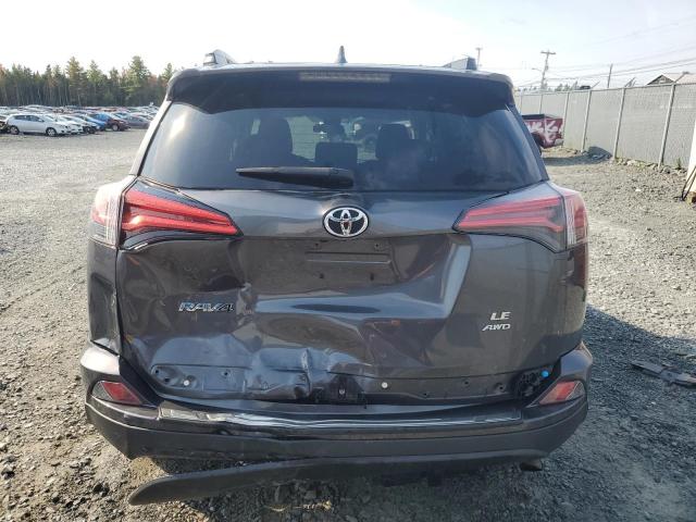 Photo 6 from auction – 2018 TOYOTA RAV4 LE with VIN 2T3BFREV5JW696030