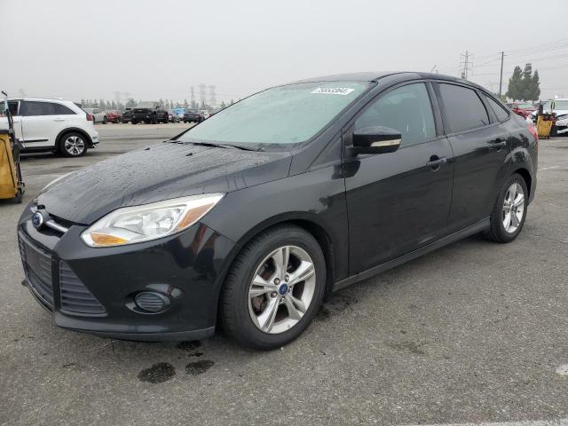 FORD FOCUS SE 2014 with VIN 1FADP3F26EL187084 - Photo from auction