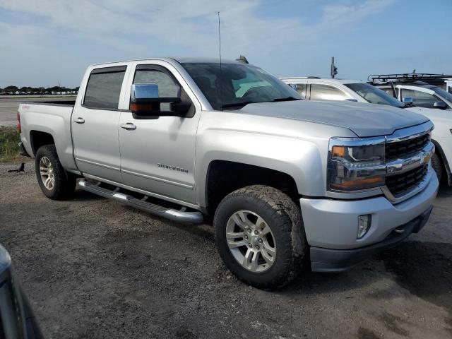 Photo 4 from auction – 2016 CHEVROLET SILVERADO with VIN 3GCUKREC9GG244254