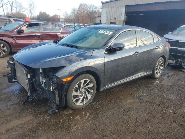 HONDA CIVIC EX 2017 with VIN 19XFC2F73HE233486 - Photo from auction