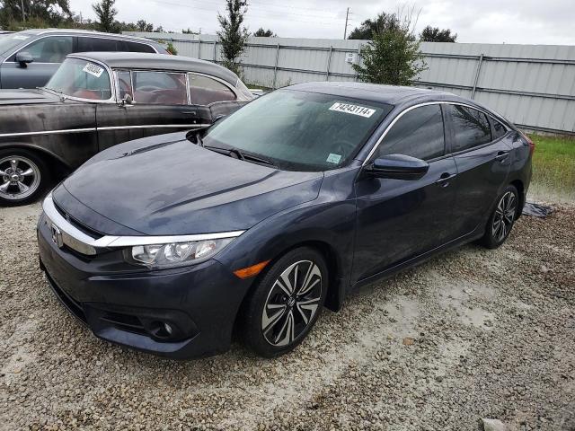 HONDA CIVIC EX 2018 with VIN JHMFC1F37JX039670 - Photo from auction