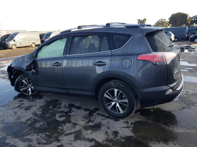 Photo 2 from auction – 2017 TOYOTA RAV4 XLE with VIN JTMRFREV1HD215874