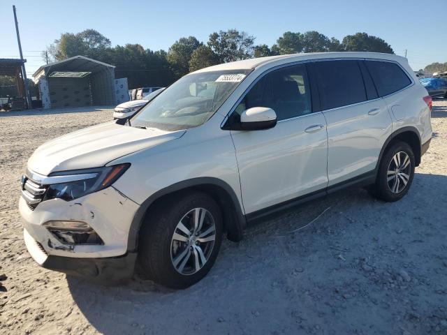 HONDA PILOT EX 2018 with VIN 5FNYF5H30JB031118 - Photo from auction