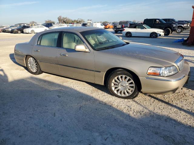 Photo 4 from auction – 2004 LINCOLN TOWN CAR E with VIN 1LNHM81W74Y629461