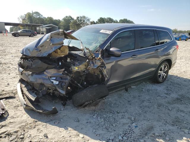 HONDA PILOT EXL 2018 with VIN 5FNYF5H57JB023857 - Photo from auction