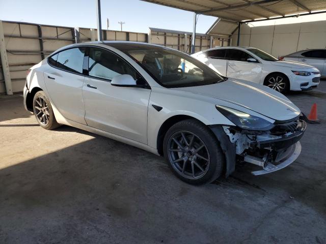 Photo 4 from auction – 2023 TESLA MODEL 3 with VIN 5YJ3E1EA1PF572437