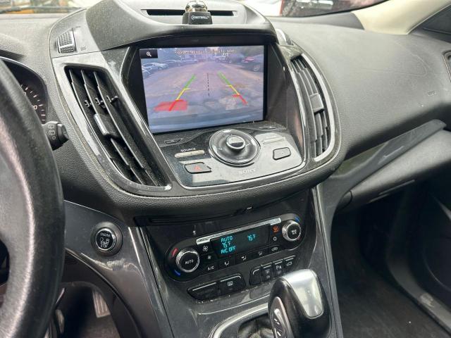 Photo 9 from auction – 2014 FORD ESCAPE TIT with VIN 1FMCU9JX2EUA01647