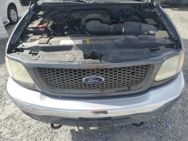 Photo 11 from auction – 2003 FORD F150 SUPER with VIN 1FTRW08L03KD67610