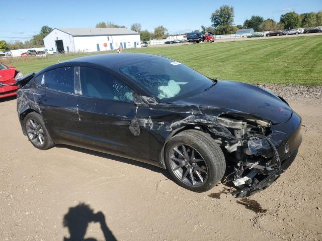 Photo 4 from auction – 2022 TESLA MODEL 3 with VIN 5YJ3E1EB1NF233859