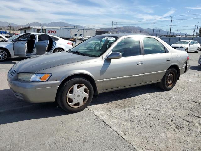 TOYOTA CAMRY LE 1997 with VIN JT2BF22KXV0028681 - Photo from auction