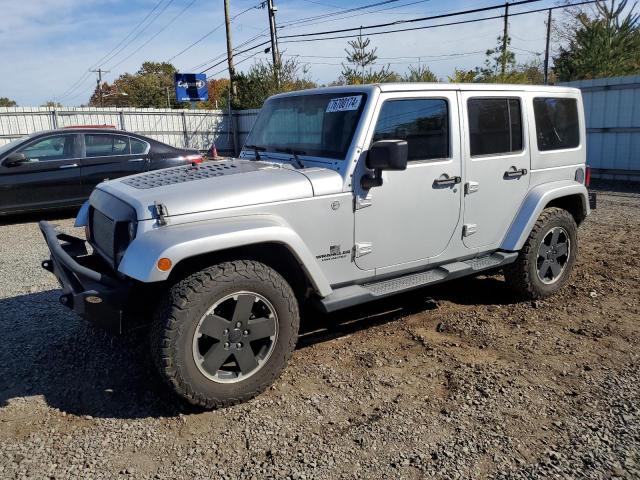 JEEP WRANGLER U 2012 z numerem VIN 1C4BJWEG5CL267118 - Zdjęcie z aukcji