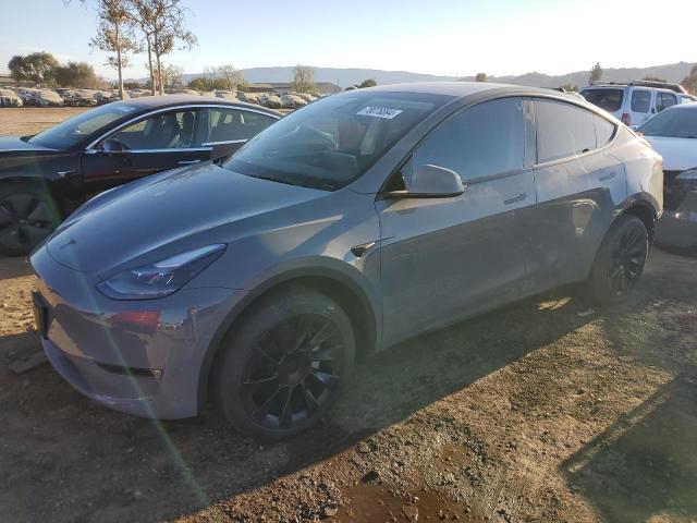 TESLA MODEL Y 2024 with VIN 7SAYGDEE4RF990565 - Photo from auction