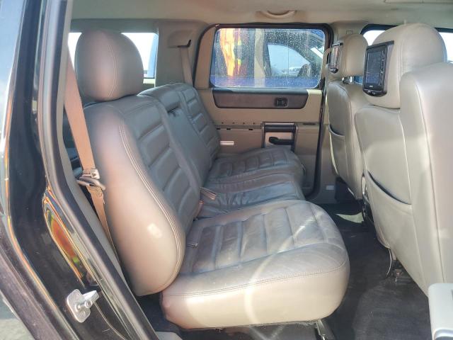 Photo 11 from auction – 2003 HUMMER H2 with VIN 5GRGN23U33H114427