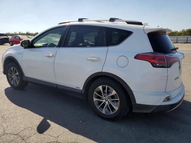 Photo 2 from auction – 2017 TOYOTA RAV4 HV LE with VIN JTMRJREV2HD083626