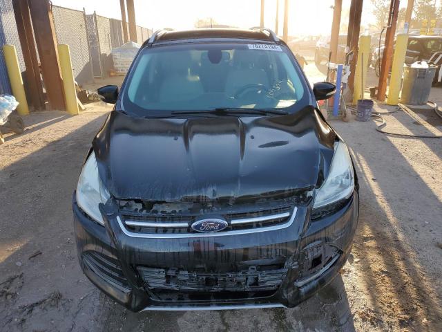 Photo 5 from auction – 2015 FORD ESCAPE TIT with VIN 1FMCU9J95FUA54040
