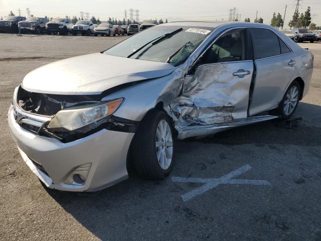 TOYOTA CAMRY HYBR 2012 with VIN 4T1BD1FK5CU056584 - Photo from auction