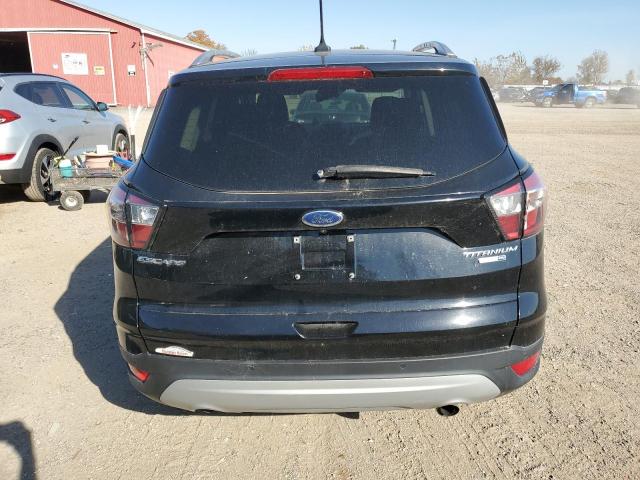 Photo 6 from auction – 2018 FORD ESCAPE TIT with VIN 1FMCU9J93JUA37553