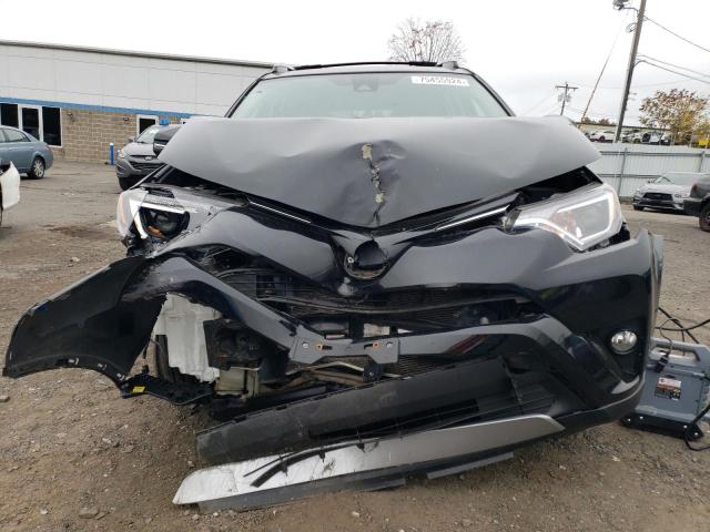 Photo 5 from auction – 2017 TOYOTA RAV4 XLE with VIN 2T3RFREV4HW557354