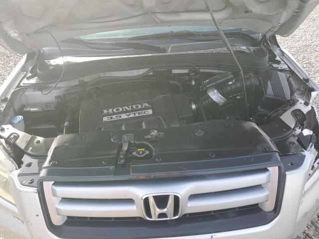 Photo 11 from auction – 2006 HONDA PILOT EX with VIN 2HKYF18596H521852