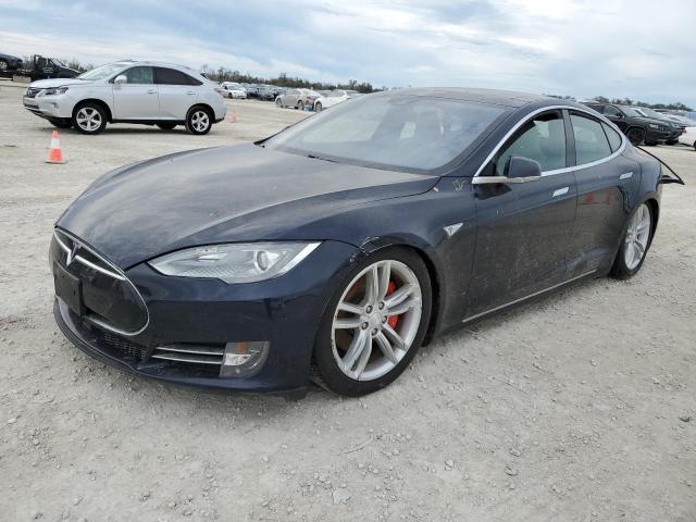 TESLA MODEL S 2014 with VIN 5YJSA1H24EFP65190 - Photo from auction