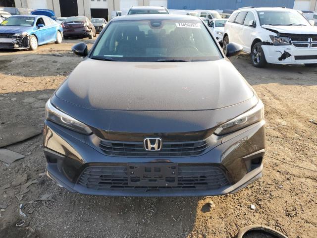 Photo 5 from auction – 2022 HONDA CIVIC EX with VIN JHMFE1F74NX000649