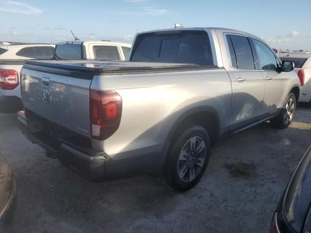 Photo 3 from auction – 2019 HONDA RIDGELINE with VIN 5FPYK3F74KB034389