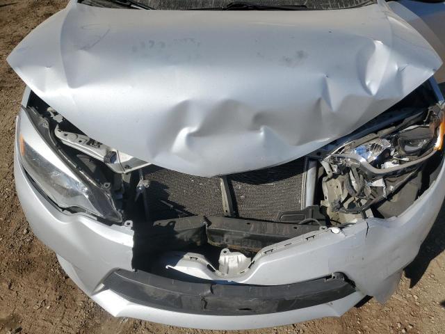 Photo 11 from auction – 2014 TOYOTA COROLLA L with VIN 5YFBURHE7EP067435